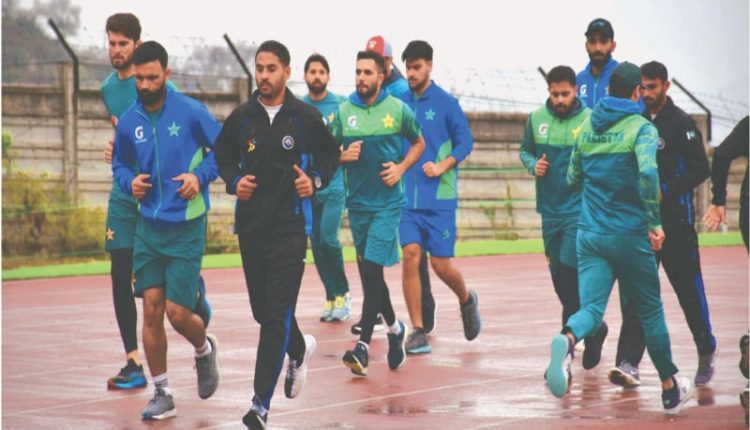 Pakistani cricketers jogging
